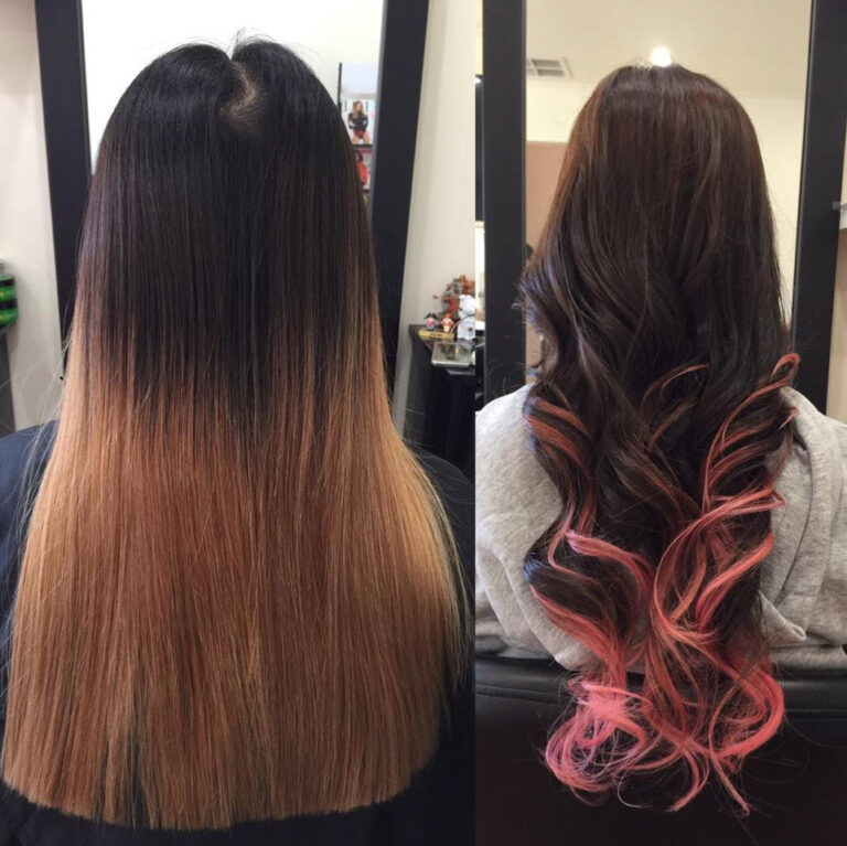 Dark hair with pink-toned colour accents and curls at Jacob’s Hair & Beauty